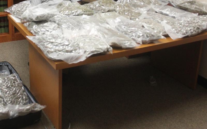 Pictured are the 36 bags of marijuana with an estimated street value of over $100 thousand that were seized by the Ville Platte City Marshal’s Office following a traffic stop on I-49 at the Whiteville exit. The individuals Edwin Pena, 30, of Houston, Texas, and Cristian Diaz, 237, of Baton Rouge were arrested and booked into the Evangeline Parish Jail on charges of manufacture/ distribution of CDS I, possession of CDS IV with intent to distribute, and possession of schedule IV. (Gazette photo by Tony Marks)