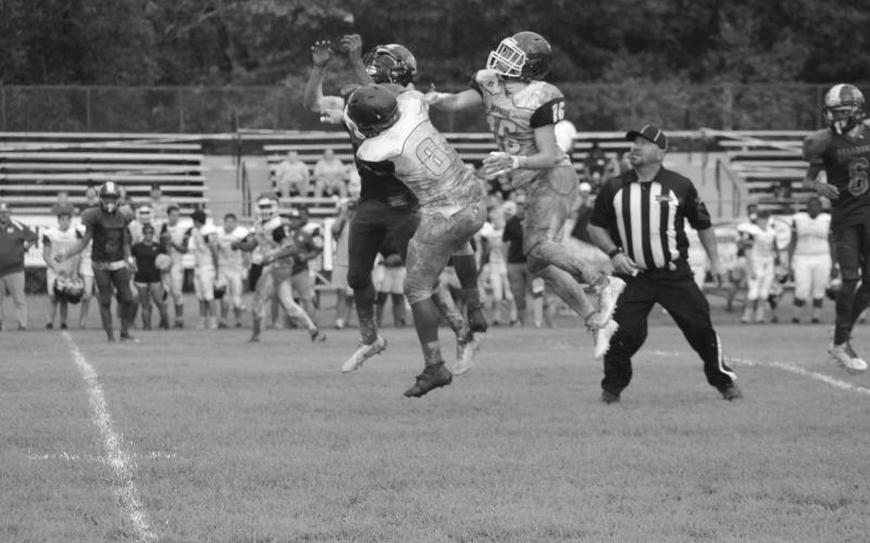Players from Ville Platte and Mamou get tangled as they go for the football during the jamboree. The two squads meet again on the football field tomorrow night in Mamou. (Gazette photo by Sylis Manuel)