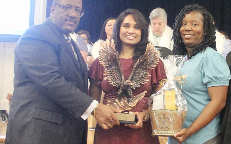 From left, at a ceremony held Tuesday, May 9, are Superintendent Lazard, High School Teacher of the Year Deepthi Nali, and Ville Platte High School Principal Chenile Tezeno. (Gazette photo by Tony Marks)