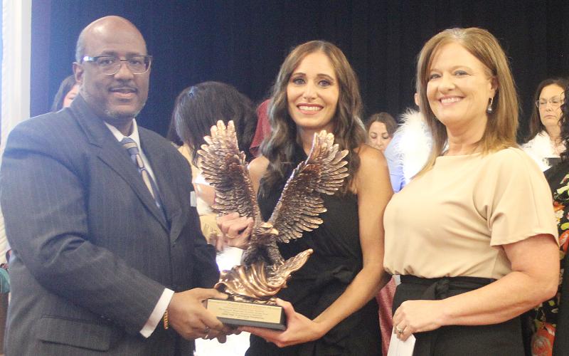 Pictured from left are Evangeline Parish Superintendent of Schools Darwan Lazard, Elementary Teacher of the Year Jackie Prudhomme, and Chataignier Elementary Principal Leslie DesHotels. (Gazette photo by Tony Marks)