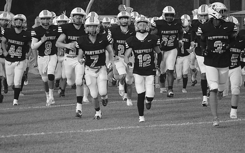 The Pine Prairie Panthers are pictured as they take the field against Church Point. The team will again take the field tonight in another district contest against Ville Platte High. (Gazette photo by Rhett Manuel)