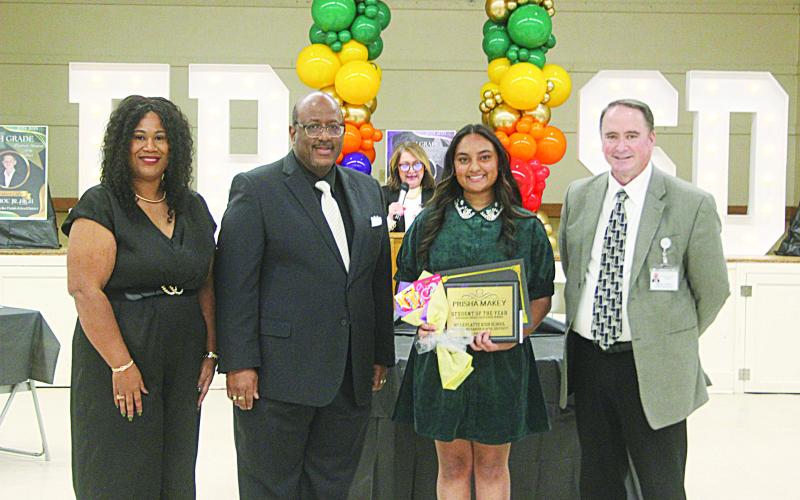 L-R: Ville Platte High Principal Shelsy Williams, Superintendent Darwan Lazard, 12th Grade Student of the Year Prisha Makey, and Assistant Superintendent Michael Lombas. (Gazette photo by Tony Marks)