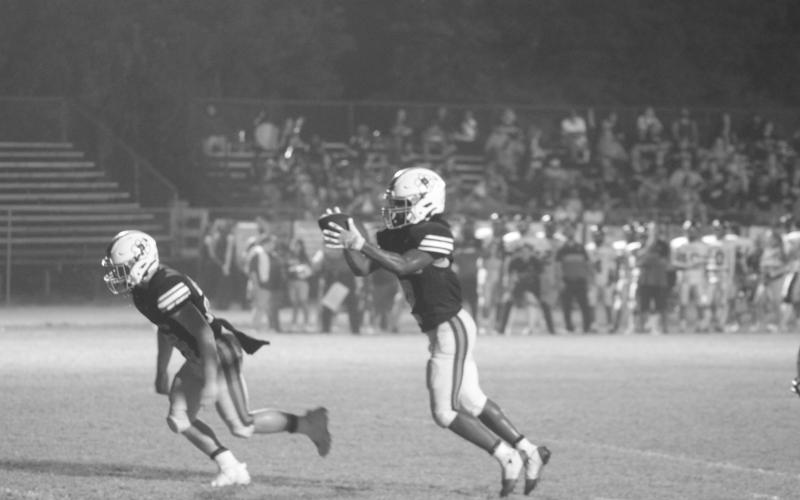 Elijah George (2) takes a direct snap at the quarterback position in Pine Prairie’s 58-13 loss to Church Point to open district play. (Gazette photo by Rhett Manuel)
