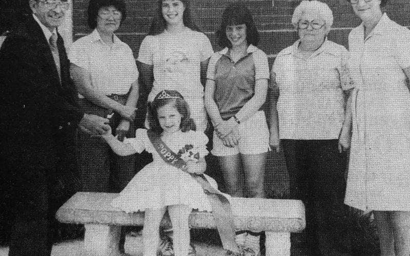 MAYOR BUYS POPPY - Ville Platte Mayor Hottell Fontenot (left) purchased the first poppy from Poppy Queen Ashli Prejean during the annual poppy sale sponsored by the American Legion. Also shown, from left next to Fontenot are members of the American Legion Ladies Auxiliary who sold the poppies at several shopping centers around Ville Platte. They are Rosie Guillory, Lynette DeBaillon, Cherie DeBaillon, Jeanette Perron and Iris LaTour. (Gazette archive photo)