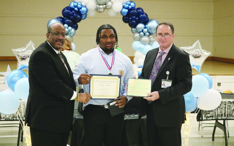 From left are Superintendent Lazard, MHS 10th grade JAG student of the year Brylyn Gage Anderson, and Assistant Superintendent Lombas.