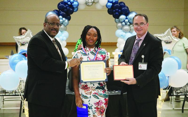 From left are Superintendent Lazard, PPHS 10th grade JAG student of the year Tiara Hutchinson, and Assistant Superintendent Lombas.