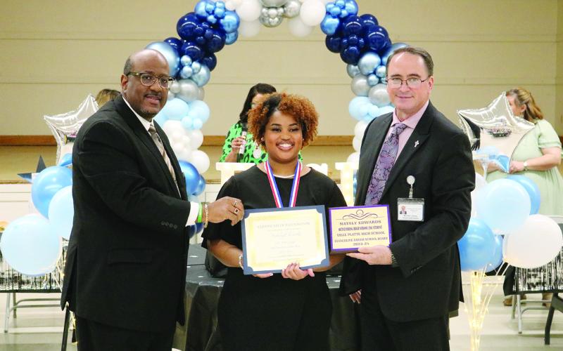 From left are Superintendent Lazard, VPHS 12th grade JAG student of the year Nataly Lanae Edwards, and Assistant Superintendent Lombas.