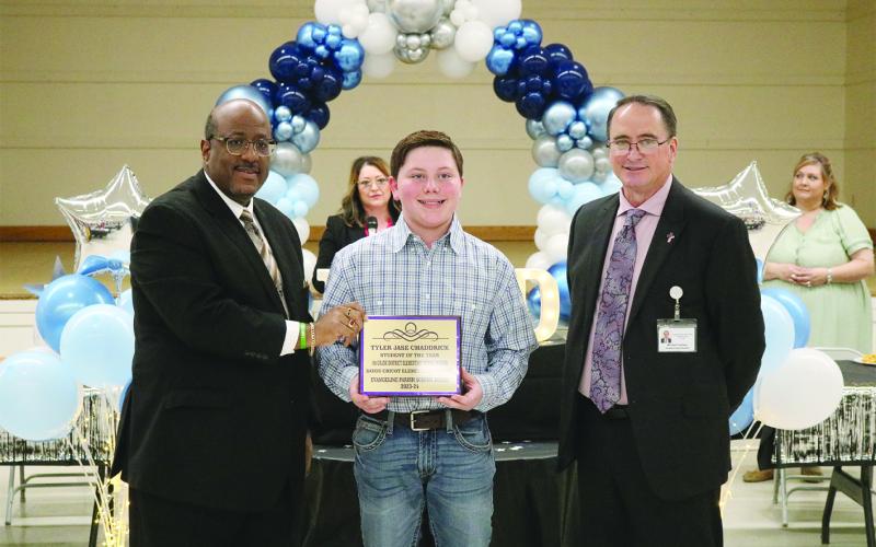 From left are Superintendent Lazard, 5th grade student of the year Tyler Jase Chaddrick, and Assistant Superintendent Lombas.