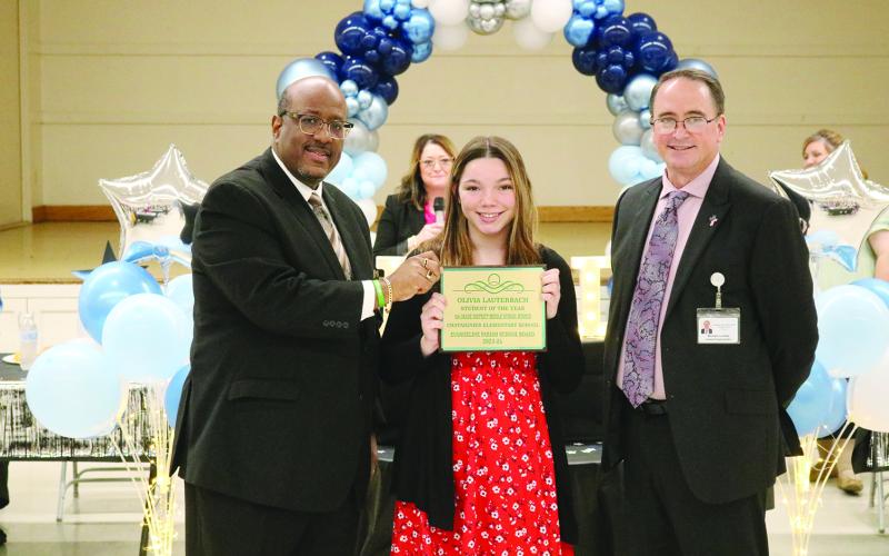 From left are Superintendent Lazard, 8th grade student of the year Olivia Lauterbach, and Assistant Superintendent Lombas. (Gazette photos by Tony Marks)