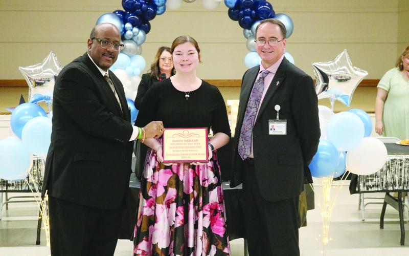 From left are Superintendent Darwan Lazard, 12th grade student of the year Daisy Berzas, and Assistant Superintendent Michael Lombas.