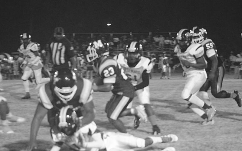 Sheamus Frank (23) gains yardage for his Mamou Green Demons against Ville Platte High. In the game, Frank went on to score his first touchdown of the season on his team’s way to a 36-31 win on homecoming night. (Gazette photo by Sylis Manuel)