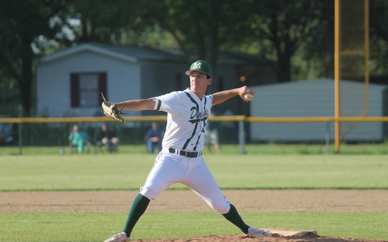 Mamou senior Andre Tate throws a pitch in relief of starter Matt Fontenot. Fontenot went 5.1 innings on the mound and was touched up for seven earned runs on 11 hits. Tate threw the final 1.2 innings and only allowed three unearned runs, three hits, and three walks. (Gazette photo by Tony Marks)