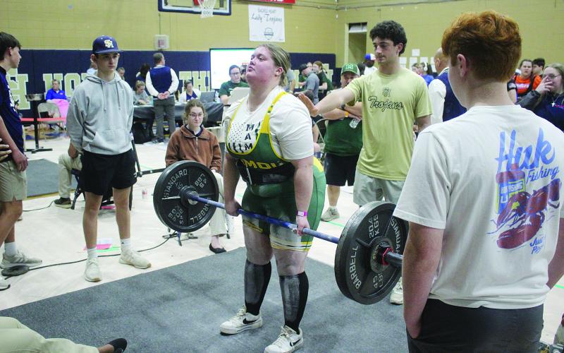 Chloe Jones, of Mamou, is pictured as she attempts a deadlift during the invitational held Saturday, January 10. She competed in the 220+ weight class with a total of 775 pounds. (Gazette photo by Tony Marks)