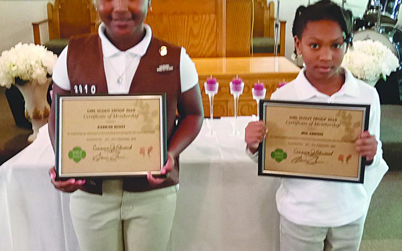 Pictured are new members of Girl Scout Troop 2010 Paislyn Scott and Mia Ardoin. (Photo courtesy of Cinama Edwards)