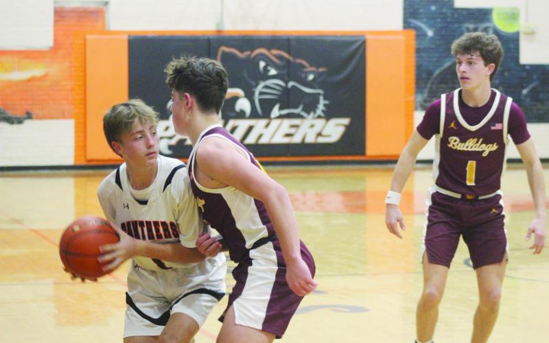 Saigan West (1) works his way around traffic in Pine Prairie’s 63-31 home loss against Iota. (Gazette photo by Tony Marks)