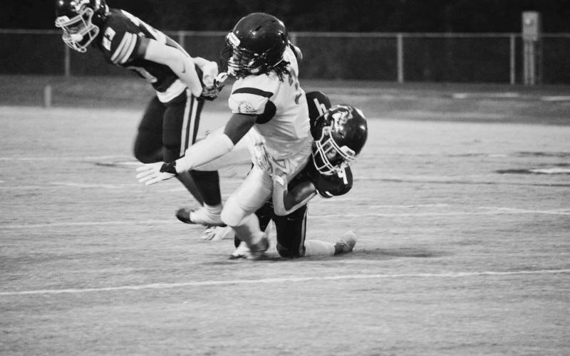 Ville Platte’s Latelldrick Prejean (3) tries to shake off a tackle from an Iota defender. (Photo courtesy of The Crowley Post Signal)