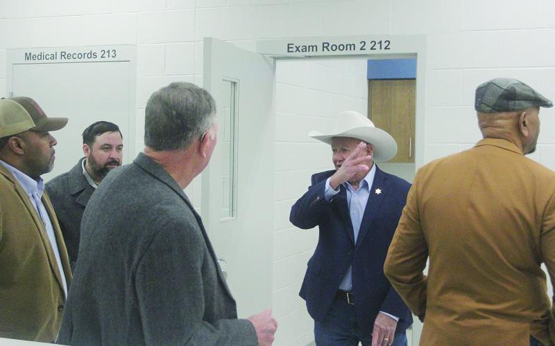 Evangeline Parish Sheriff Charles Guilory (center) leads Rotarians on a tour of the the new parish jail on Tuesday, January 27. Counter-clockwise are Rotary President Beau Wilson, Ville Platte Mayor Ryan LeDay Williams, Bill Brunet, and Clem LaFleur. (Gazette photo by Tony Marks)