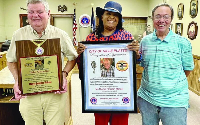 From left are Ville Platte City Councilman Mike Perron, Ville Platte Mayor Jennifer Vidrine, and KVPI General Manager Mark Layne. (Gazette photo by Nancy Duplechain)