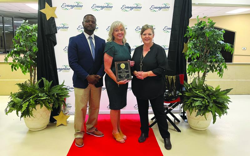 From left: Darion Arvie, Business Person of the Year Kimberly Bourgeois, and Connie Lamke.