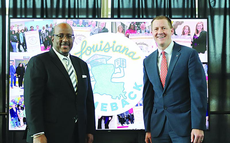 Evangeline Parish Superintendent of Schools Darwan Lazard is pictured on the left with State Superintendent Dr. Cade Brumley at a LEAP Success Press Conference held in Bossier City on Wednesday, August 2. The school district was recognized and honored for ranking tied for the second spot of year-to-year percent of Mastery and above change with a +4% growth. (Photo by Tone Tezeno)