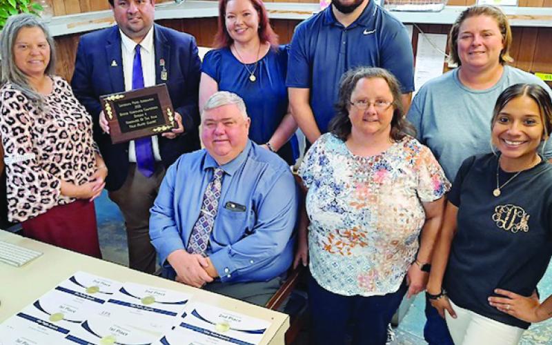 From left are: back row- Kathy Longino, advertising manager; Tony Marks, editor; Nancy Duplechain, staff reporter; Rhett Manuel, sports editor; and Jeneane Miller, bookkeeping; front row- Garland Forman, publisher; Heather Bogard, associate editor; and Jessika Dupre, receptionist/ circulation. Not pictured are Becky Nelson, advertising; and Monique Ardoin, composition manager. (LSN photo by Carissa Hebert)