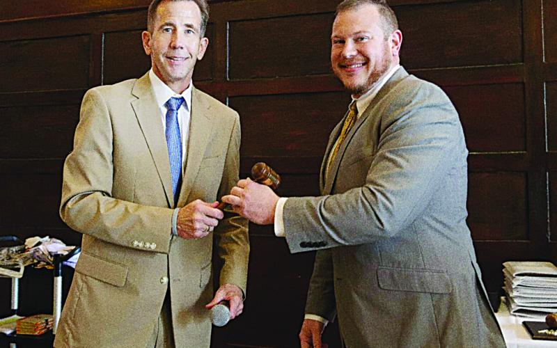 Outgoing LPA President Sam Hanna Jr. (left) ceremoniously passes the gavel to new president J. McHugh David Jr. (right). (Photo submitted)