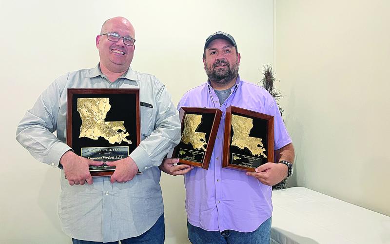 Raymond Partsch III (left) and Tony Marks (right) hold their major awards that they won at the 2025 Louisiana Sports Writers Association Awards Contest luncheon in Natchitoches on Sunday, June 28. (Photo by Tina Partsch)