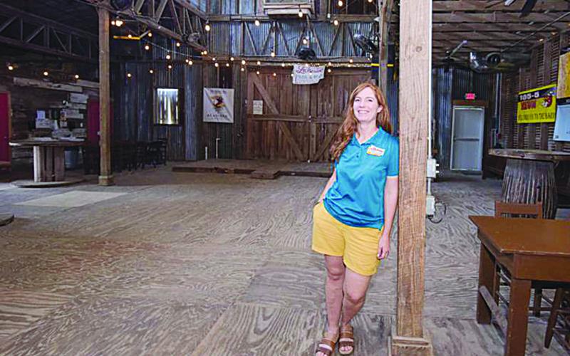 Co-owner Bonnie Kyzar stands inside The Barn Dancehall and Pavilion at Lakeview Park and Beach, outside of Eunice, on Thursday, May 14. Many of the activities of Balfa Week, Grand Hoorah and Black Pot Music Camp are held here. (Advocate photo by Robin May)