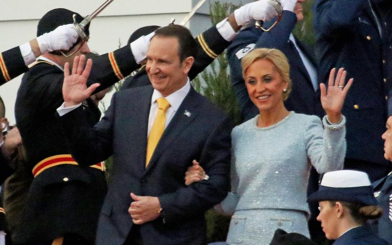 Gov.-elect Jeff Landry and his wife, Sharon, walk down the steps of the state capitol on Sunday during the inauguration ceremony. (LSN photo by Harlan Kirgan)