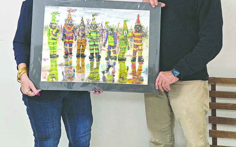 SERIES OF PAINTINGS DONATED - Mamou native and retired colonel with the U.S. Marine Corps Jonathan Neal (J.N.) Vizina, recently donated a series of seven Mardi Gras-themed watercolor prints to be displayed at Mamou Town Hall. In the top left photo, Mamou Mayor Leisa Deshotel and Vizina pose with one of the prints. The rest of the photos are from the series of seven to be framed and displayed. (Photos courtesy of Leisa Deshotel)