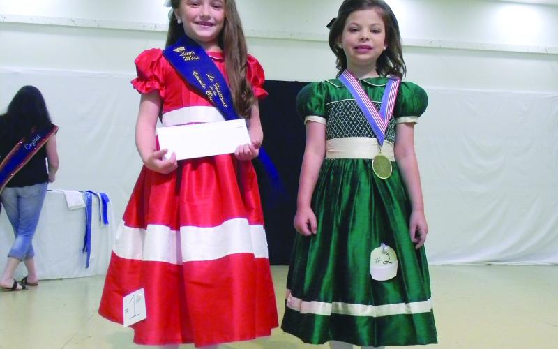 LITTLE MISS COURT - Shown, from left, are Little Miss Viande Boucanèe Emma Kojis and Aubrey Christine Miller, first runner-up.