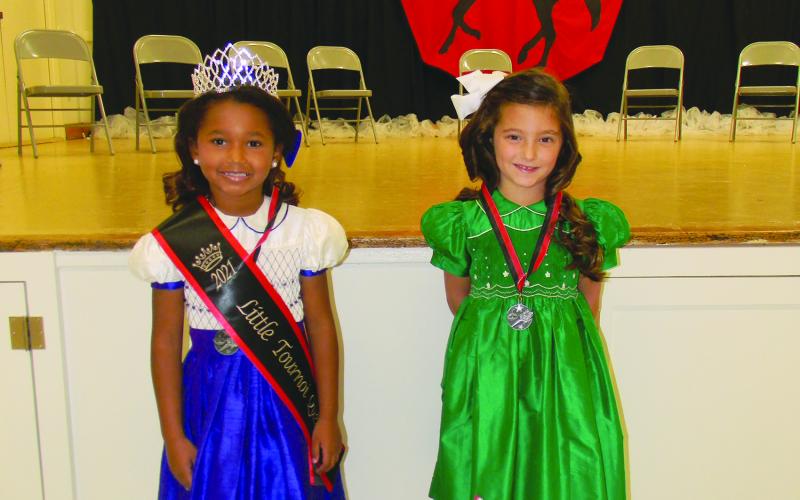 LITTLE MISS TOURNOI COURT - Shown, from left, are the members of the Little Miss Tournoi Court. They are Queen Ada-Claire Traore’; and Emma Kojis first runner-up.