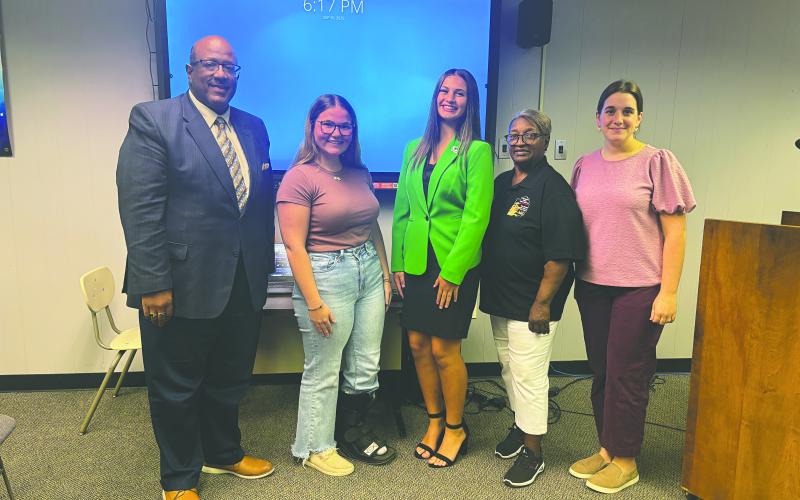 MAMOU HIGH SCHOOL 4-H - Shown, from left, are Superintendent Darwan Lazard, Mamou High School 4-H students Camille Bieber and Danilynn Landreneau, EP School Board member Sheila Joseph, and 4-H Agent Madison LaTour. (Gazette photo by Heather Bogard)