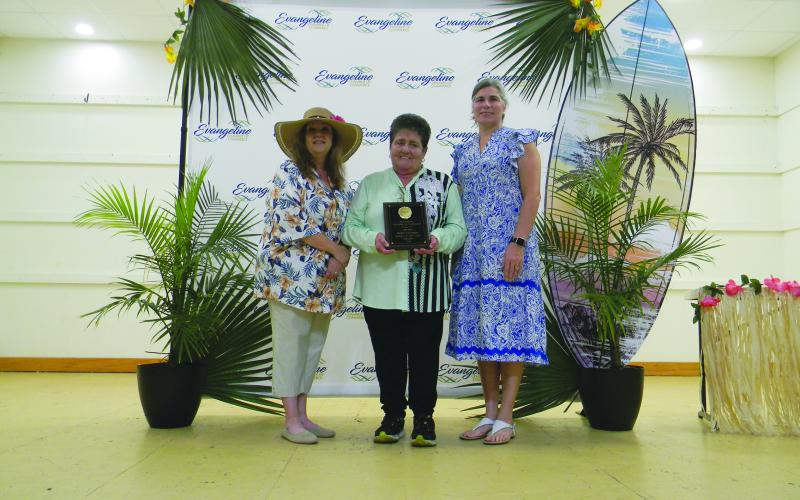 WOMAN OF THE YEAR - Mable Foreman was named Woman of the Year during the banquet held Thursday, September 19. She is shown with Connie Lamke (left) and Angela Fontenot (right).