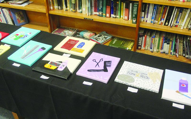 Pictured is some of the art that was on display during the first annual fine art exhibit at Mamou High School. (Gazette photo by Tony Marks)