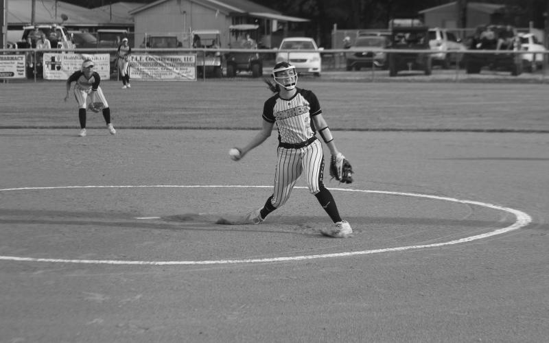 Pine Prairie starting pitcher Ava Kordish (2) readies to deliver a pitch against Many in the second round of the Division III Non-Select playoffs. (Gazette photo by Rhett Manuel)
