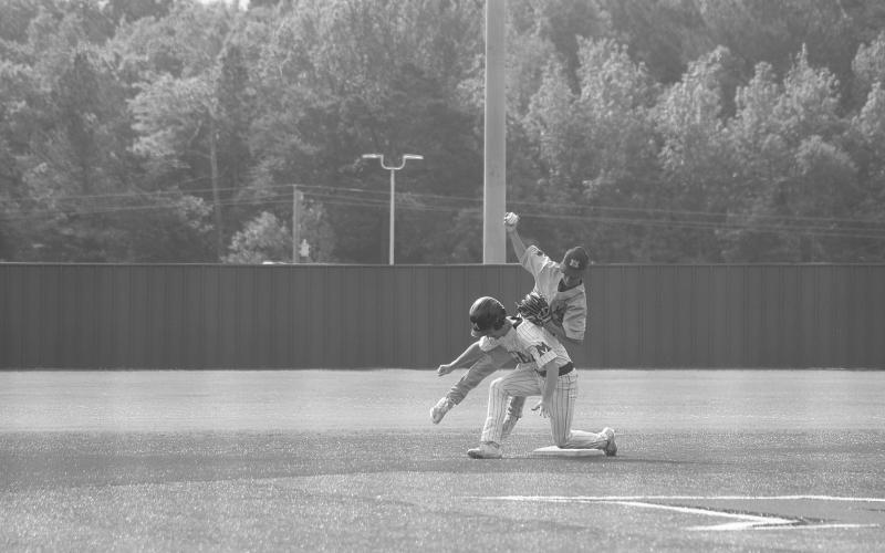 Oliver Perron (1) makes a play at second base against a Many baserunner in Mamou’s 11-7 loss in the second game of a best-of-three series on Saturday. (Gazette photo by Tony Marks)