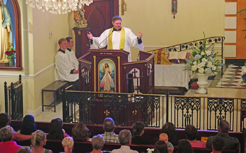 Father Korey LaVergne of St. Edwards Church gives the homily during the annual Charlene Richard Mass. The Mass was celebrated on Monday, Aug. 12. (LSN photo by Claudette Olivier)