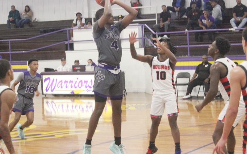 Montavis Seraille (4) attempts a basket for his Ville Platte Bulldogs against the Welsh Greyhounds on the third day of Oakdale’s New Year Tip-Off Presented by RoyOMartin, which was held back in January. (Gazette photo by Rhett Manuel)