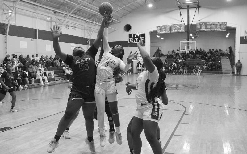 Yazminn Ardoin (3) goes up for a loose basketball in Ville Platte’s win over North Webster in the first round of the Non-Select Division III  playoffs. (Photo courtesy of Nick Jagneaux)