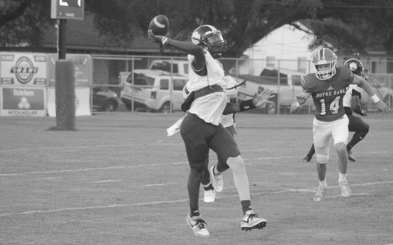 Zion Thomas (8) delivers a pass in Ville Platte High’s 42-7 loss against Notre Dame to fall to 0-2 on the season. (Gazette photo by Tony Marks)