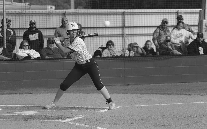 Jodie Landry (23) waits for a pitch to cross home plate in Sacred Heart’s 9-5 loss to Opelousas Catholic on Tuesday afternoon. (Gazette photo by Rhett Manuel)