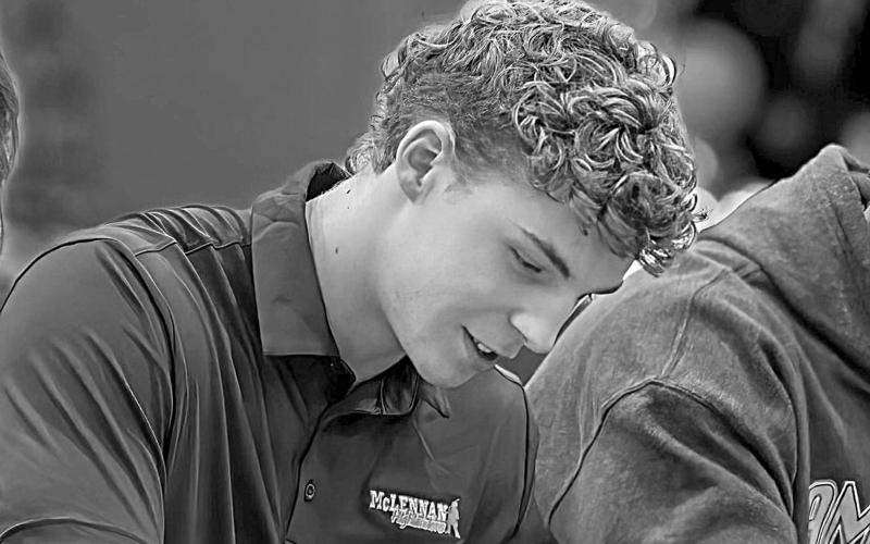 Owen Smith, the son of Gerard and Holly Smith and grandson of Terryl and Barbara Fontenot, is pictured as he signs with McLennan College. (Photo courtesy of Gerard Smith)