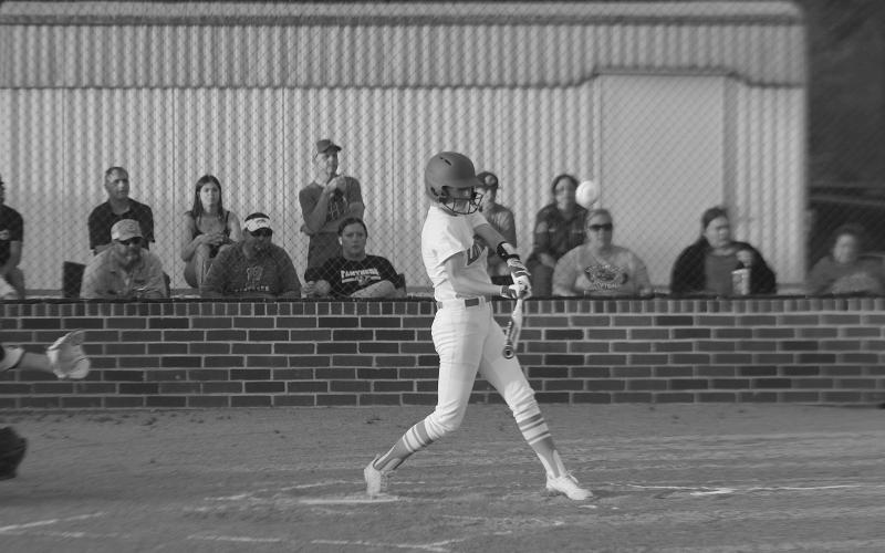 Harlie Arnaud, of the Pine Prairie Lady Panthers, connects with a pitch in a game against Oakdale played earlier this season. The team now takes its show on the to the postseason and was scheduled to host Crowley this past Friday. Results of that game will be in Thursday’s edition of the Ville Platte Gazette. (LSN photo by Tony Marks)