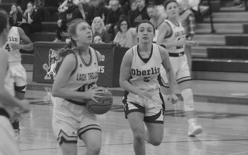 Sacred Heart’s Rose Ardoin (40) looks to make a basket in the Lady Trojans’ narrow two-point loss to the Oberlin Lady Tigers in the Kendall and Brad Memorial Holiday Shootout. (Gazette photo by Rhett Manuel)