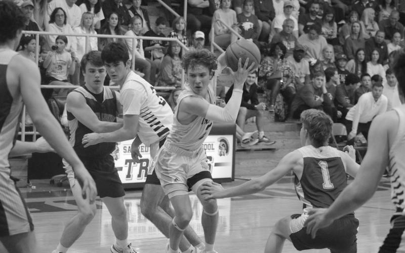 Hayden Deshotel (2) moves his way to the goal as his Trojans earn a win at home against Ouachita Christian. (Gazette photo by Tony Marks)