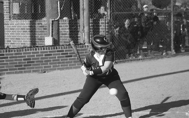 Lady Bulldog Kaislyn Lafleur (21) watches a pitch cross home plate in a district loss to Pine Prairie. (Gazette photo by Rhett Manuel)