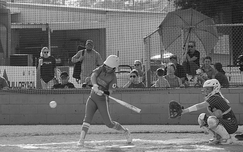 Victoria Briscoe (1) waits for a pitch to cross the plate in a Pine Prairie Lady Panther softball game. (Gazette photo by Rhett Manuel)