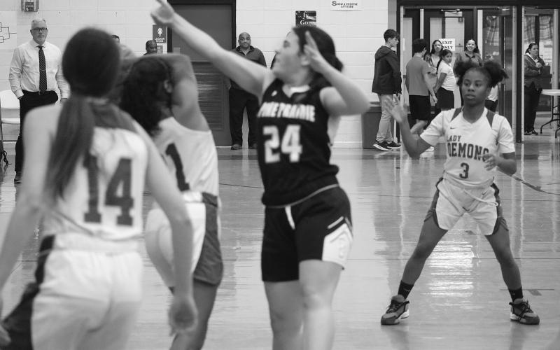 Pine Prairie’s Kelsey Olivier (24) looks to swat away a Mamou pass. (Gazette photos by Tony Marks)
