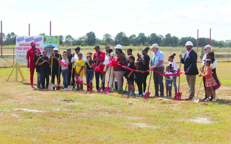 Pictured are the community members and city officials who gathered for the groundbreaking at Hargrove Park. Among those are Mayor Jennifer Vidrine; City Councilmembers Bryant Riggs, Jordan Anderson, Christina Sam, Mike Perron, and Jerry Joseph; and City Engineer Ronnie Landreneau. (Gazette photo by Tony Marks)